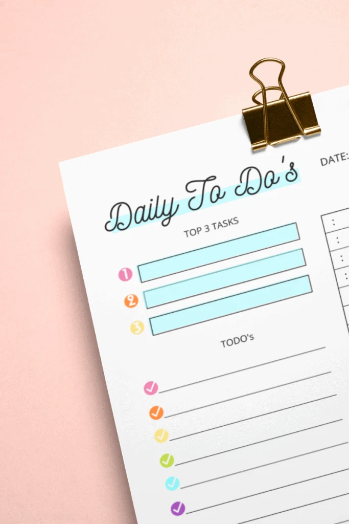a close up of the top corner of the day planner printable rainbow printable daily planner page. 